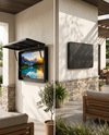 Outdoor TV enclosure installed on a covered patio